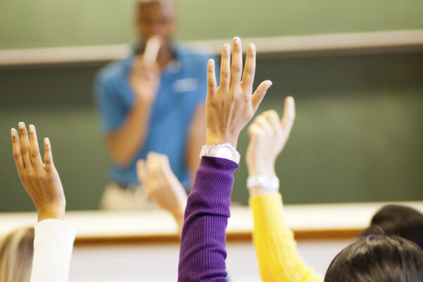 students_hands_raised2.jpg