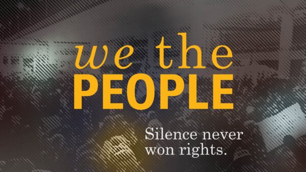 Dark gray background with protest signs highlighted in pastel colors. We the PEOPLE is written in mustard yellow in the center. Under that to the left in white is Silence never won rights.