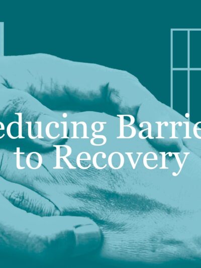 Teal and blue helping hands in front of jail bars. "Reducing Barriers to Recovery" in white text centered in front