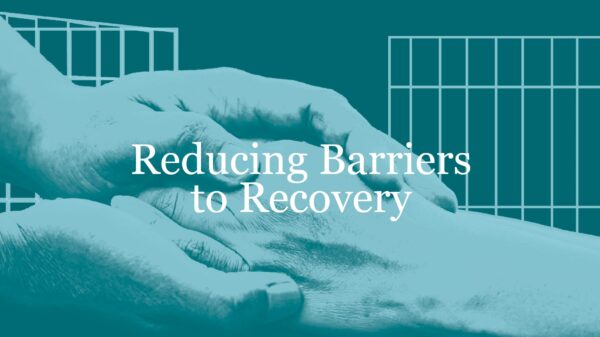 Teal and blue helping hands in front of jail bars. "Reducing Barriers to Recovery" in white text centered in front