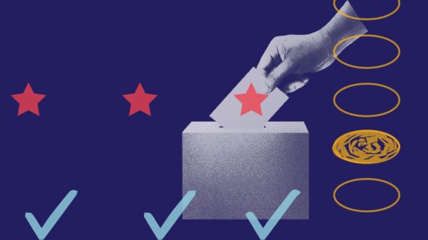 Dark blue background. Dark blue and white hand putting a ballot in a ballot box. Three light blue check marks along the bottom, three red stars across the middle and the ballot box. five yellow fill in bubbles with the fourth filled in along the right.