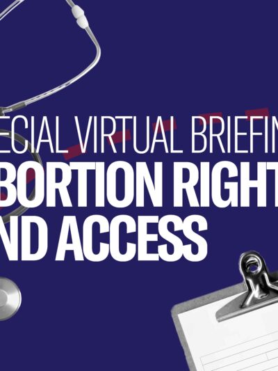 Navy blue with a maroon dotted line across. A black and white stethoscope in the top left corner, and black and white clipboard in the bottom right corner