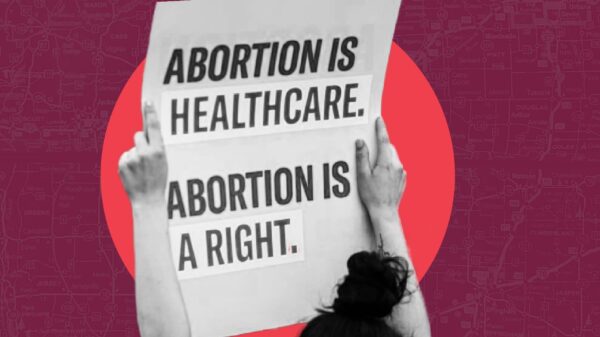 Red and pink filtered background with protestors. Text: PROTECT ABORTION RIGHTS IN DANVILLE. On the right hand holding megaphone in front of yellow circle