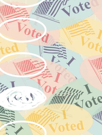 Colorful "I Voted" stickers with a filled in circle over them.