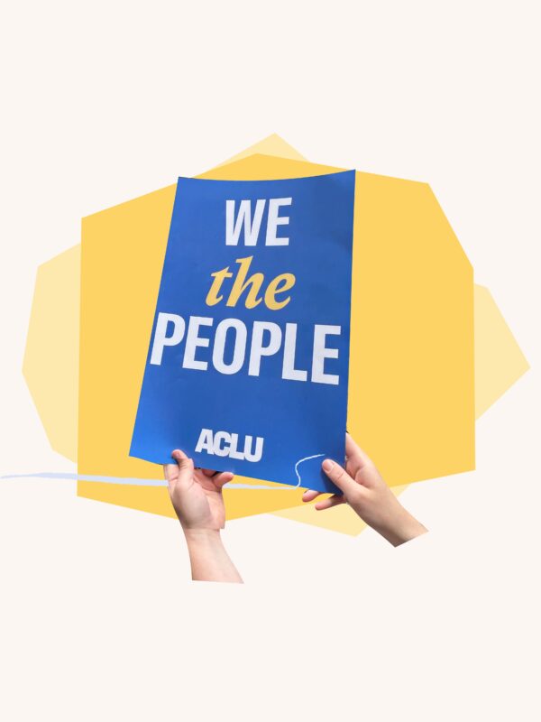 Hands holding "We the People" sign over yellow geometric shapes