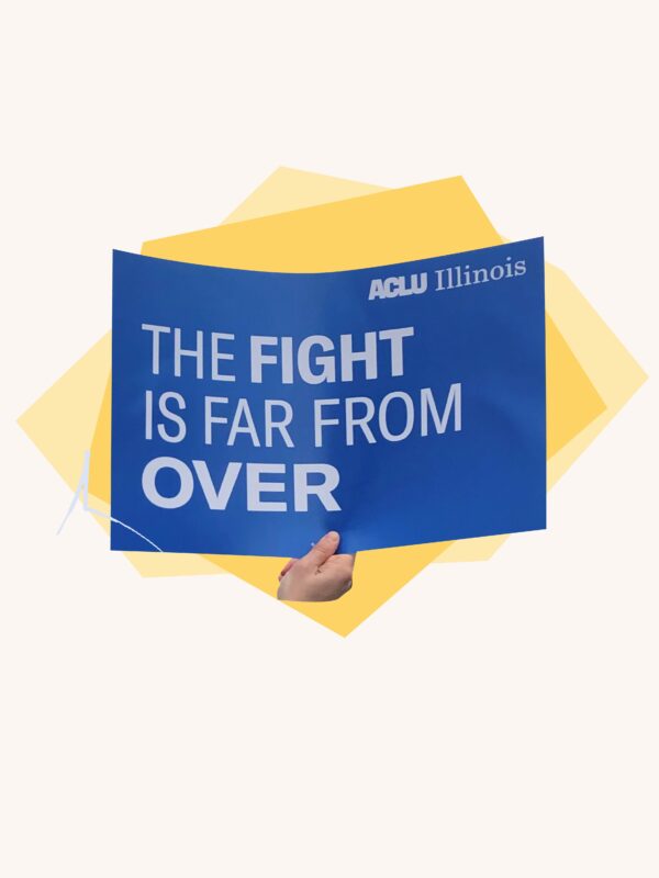 Hands holding "The Fight is Far From Over" sign over yellow geometric shapes