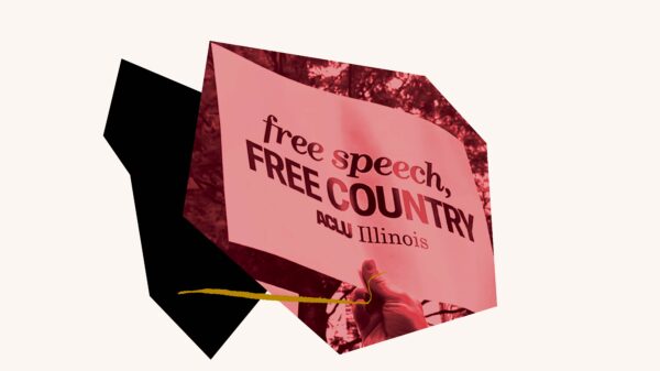 Red filtered image of "Free Speech, Free Country" sign