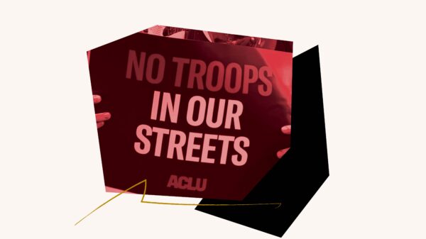 Red filtered image of "No Troops in Our Streets" poster