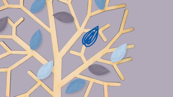 Light purple background. Tree with blue and purple leaves.