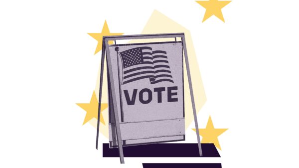 Purple filtered "vote" sign