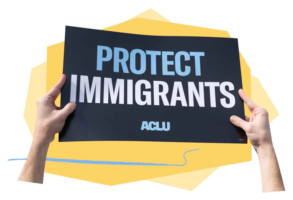Hands holding navy blue sign with light blue text "Protect Immigrants". Behind image is two yellow geometric shapes