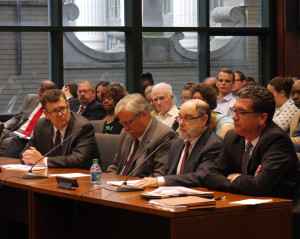 Ben Wolf (second from right) testifies before the  Senate Human Services Committee on behalf of clients protected under ACLU consent decrees 