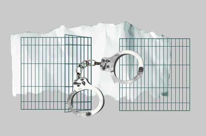 Gray background. Dark green jail cell with black and white handcuffs