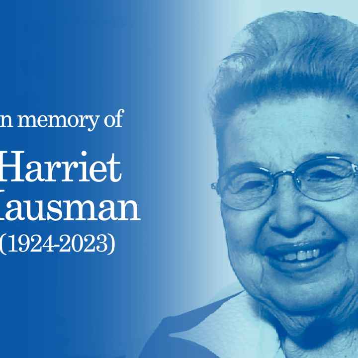 Blue filtered image of Harriet Hausman. White text "In memory of Harriet Hausman (1924-2023)"