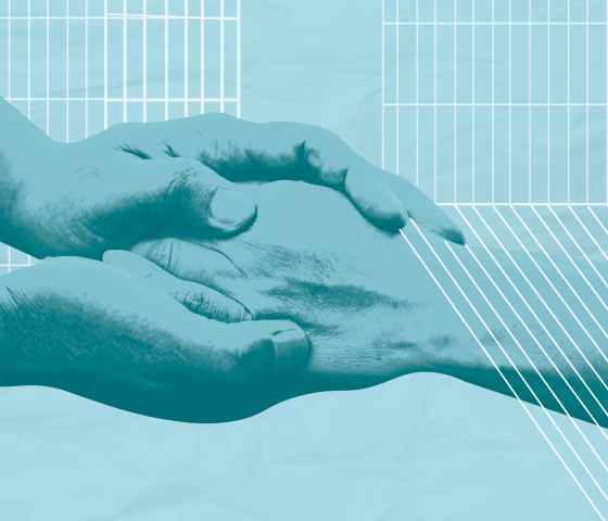 light blue background with two hands holding another hand across the image. On the top is white jail cells. On the right the lines of the cell extend on an angle over the hand.